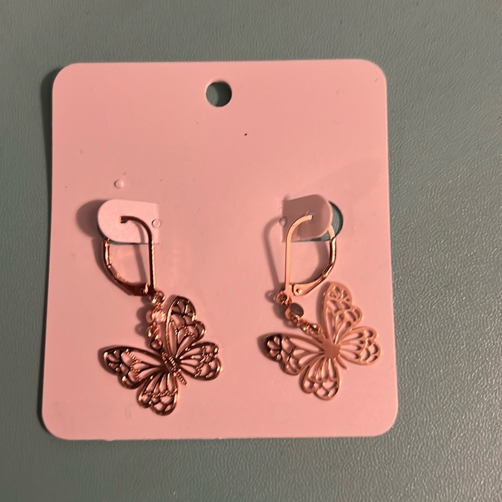 Butterfly whimsy earrings new in gold